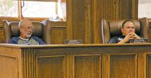Jack County Commissioners Gary Oliver and Kenny Salazar in a past meeting. The county discussed their budget Monday, Aug. 12. Archive photo