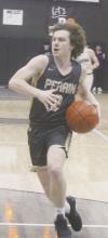 Hunter Walker heads to the basket for a Perrin first quarter basket. Perrin suffered a 61-37 loss to No.1-Graford. Photo/Brian Smith