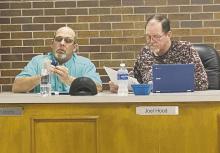 Aldermen John Moffit (left) and Joel Hood discuss the design of the water treatment plant as part of the Monday, March 10 council meeting. The design is 60% complete. Photo/Brian Smith
