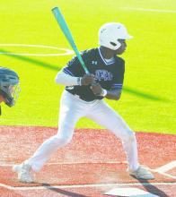 Senior Kaleem Howard watches a pitch during game one of the Tigers’ regional quarterfinal series Friday, May 17 with Iowa Park. Jacksboro won the series’ opener, 5-0. Photo/Brian Smith