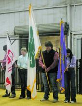 Students bow their heads to pray prior to the swine show at the 2024 Jack County Youth Fair, held Jan. 3-6. Check out the six-page B-section for full results from the show. Photo/Brian Smith