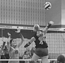 Savannah Hearn goes up for a hit during the Tigerette’s performance at last weekend’s Lu Allen Memorial Tournament in Graham. Photo/TC Gordon/The Graham Leader