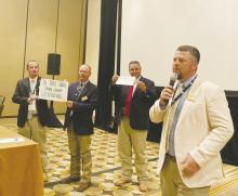 Perrin Ag teacher Jacob Lange speaks to the breakfast crowd at the ceremony where he was named Mid-Career Teacher of the Year. Lange was named Texas Ag Teacher of the Year and Tarleton State Alumni Young Teacher of the Year. Contributed photo