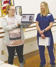 Faith Community Rehab and Nursing Administrator Jacey Brittain, right, and Director of Therapy Julie Kidd speak to Jacksboro Lions Club members about their facility and explained the different types of therapy. Photo/Brian Smith