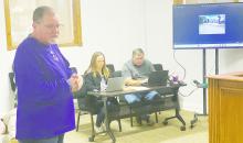 Long Term Recovery Committee Chair Joel Hood speaks to Jack County Commissioners with an update on five homes being constructed in the city as a result of the March 2022 tornado during their Jan. 8 meeting. Photo/Brian Smith
