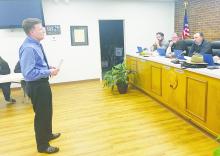 Mike Tibbits with Hayter Engineering speaks about plans for the elevated sewer line crossing at Sewell Park during the Jacksboro city council meeting Monday, Feb. 27. The project will be paid out of American Rescue Plan funds. Photo/Brian Smith