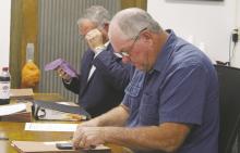 Jack County Precinct 4 Commissioner Terry Ward crunches some numbers during the Tuesday, May 27 meeting. Photo/Brian Smith