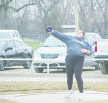 Bryson hosted its annual track meet for both high school and junior high students Thursday, March 9 at Cowboy Field. Several area schools, including county rival Perrin, took part in the event. Because of the adverse weather no long or triple jump events were held. Bryson’s Adi Louder competes in the discus. No results were available as of press time. Photo/Brian Smith