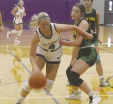 Hayden Walker (4) drives around a defender during first half action in the Tigerettes’ 53-19 win over Dublin. Photo/Brian Smith