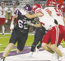 Will Treadway (62) looks to open a hole for his offense during first half action of the Friday, Nov. 8 game with Holliday. The Tigers lost the game but will face Brady in the first round of the playoffs Friday, Nov. 15 at Clyde ISD Stadium. Photo/Brian Smith