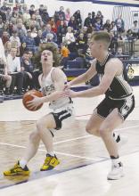 Perrin’s Hunter Walker, left, drives inside during first quarter action. Graford picked up a 39-38 win. Photo/Brian Smith