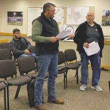 Gallagher Construction Services Lead Estimator Robert Black, left, and Chief Estimator Phillip Adlof give details about the guaranteed maximum price for bond items during a special Jacksboro ISD meeting Thursday, March 28. Photo/Brian Smith