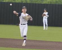 Noah Morris fires the ball over to first base following a Bryson grounder to shortstop. Morris and the Pirates posted a 5-0 win knocking the Cowboys out of the playoffs. Photo/Brian Smith