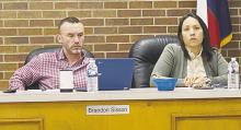Place 1 Alderman Libby Gonzales, right, and Place 2 Alderman Brandon Sisson listen to a presentation on pool party rates during the city council meeting Monday, March 25. Photo/Brian Smith