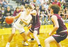 Perrin’s Jack McCormick (10) drives inside on Saint Jo defenders during the bi-district game. Photo/Brian Smith