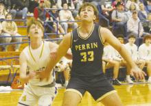 Perrin’s Ryan Richerson (33) blocks out Wiett Newton of Bryson during the Pirates’ 53-49 win. Photo/Brian Smith