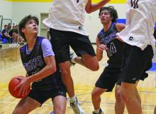Braeden Rockey looks for his shot or to pass to someone during the game with Seymour. Rockey had a 31-point game in the Tigers’ 5348 win over the Panthers. Photo/Brian Smith