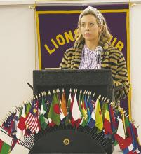 Jacksboro ISD Cheer Director Jaci Pippen speaks to Jacksboro Lions Club members at their Wednesday, Feb. 28 meeting. Photo/Brian Smith