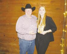 The Jonas family was honored twice during the 2023 Jacksboro Chamber of Commerce banquet Saturday, Feb. 18 with Travis Jonas, left, named Citizen of the Year and daughter, Erin, a senior at Jacksboro High School, selected as Youth Volunteer of the Year. Further awards and details will be found in a future issue of the Jacksboro Herald-Gazette. Photo/Brian Smith