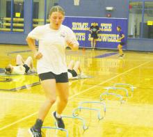 A Cowgirl goes through an agility workout during strength and conditioning camp last week. Coaches work on sports specific drills and agility daily as part of camp. Photo/Brian Smith