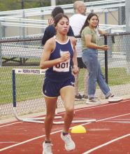 Perrin senior Erika Hernandez competes at the district meet Oct. 11. Hernandez finished 11th overall in the varsity girls division. Photo/Brian Smith