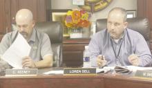 Perrin-Whitt CISD Superintendent Loren Sell gives his report while Board President Chris Keeney, left, listens during the Tuesday, Sept. 17 meeting. The district is looking at a potential bond issue but no decision has been made yet. Photo/Brian Smith
