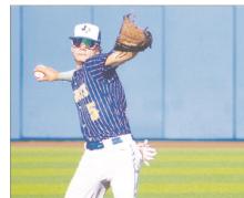Caleb Allen fires the ball over to first base following a groundout in the Cowboys’ match-up against Dodd City. Photo/Brian Smith