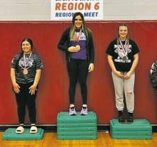 Jacksboro High School junior Landrie Valenzuela, center, won her weight class Saturday, Feb. 25 at the Region 6 Powerlifting Meet at Bells High School, qualifying her for the state meet Thursday, March 16 in Frisco. Courtesy photo