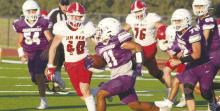 Axel Salazar looks for running room during the JV Purple’s game Thursday, Sept. 19 with Jim Ned. Jacksboro fell behind early but scored on six straight possessions to post a 39-21 win over the Indians. Photo/Brian Smith