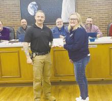 Jacksboro Police Department Detective Adam Rydlinski was named investigator of the Year by the Children’s Advocacy Center as part of the Jacksboro City Council meeting Monday, Dec. 11. Photo/Brian Smith