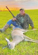 The writer and the last deer of the season. It was a season that will last a lifetime. Photo/Luke Clayton