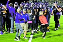 Jacksboro Tigers and fans celebrate on the field after their Friday, Nov. 3 home win over the Dublin Lions. The 73-7 thrashing brought the Tigers to a perfect 10-0 for the season. Photo/Hannah Henderson