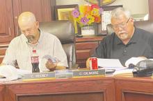 Lambert resigns