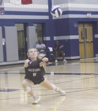 Jacksboro senior Kylie Tullous dives to save the ball from a City View return for a dig during the Tigerettes’ match in Wichita Falls Sept. 26. Tullous and her teammates snapped a lengthy district losing skid with a straight set win over the Lady Mustangs. Jacksboro will travel to Iowa Park Saturday in a revenge match vs. the Lady Hawks, who beat them in five games in the first meeting. Photo/Brian Smith