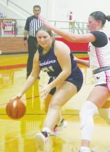 Savannah Hearn moves the ball through the lane for Jacksboro during the Tigerettes’ 4027 loss Friday, Nov. 15 against the Mineral Wells Lady Rams. Photo/Brian Smith