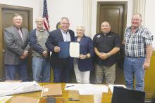 Jack County Commissioners presented Sharon Van Baale with a proclamation remembering Thursday, May 2 as a National Day of Prayer. Ceremonies will be held outside the Jack County Courthouse as well as both Perrin and Bryson beginning at noon. The public is invited and encouraged to attend as prayers will be sent honoring the military, the family, law enforcement and other entities. Contributed photo