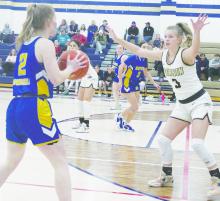 Perrin’s Jessa Angelly (3) plays defense on Bryson’s Kassidie Newton during the Lady Pirates’ game Friday, Jan. 19 with the Cowgirls. Perrin got out to a quick start and posted a 49-15 win. Photo/Brian Smith