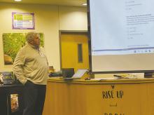Jacksboro ISD Superintendent Brad Burnett explains as survey for what Facilities Vision Committee members would fill out during a Nov. 28 meeting. Committee members were asked to rank what they saw as the district’s biggest needs. Photo/Brian Smith