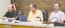 Left to right, aldermen Tyler Harmonson, Joel Hood and Greg Robinson listen to the debate on interviewing a police chief candidate or waiting to do so during the Monday, June 9 Jacksboro City Council meeting. Robinson started the conversation by suggesting a committee be formed. Photo/Brian Smith