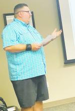 Tom Pennington speaks to the Bryson ISD board during its Thursday, July 27 meeting. Pennington wants to donate a plaque to the community park this fall. Photo/Brian Smith