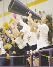 Perrin met up with Dodd City in the Class A basketball regional quarterfi nals Tuesday, Feb. 27. The Pirates and their fans, including senior Erika Hernandez (with megaphone), cheered on their team, but the Hornets were too much and posted a 60-54 victory, knocking the 5th-ranked Pirates from the tournament with a 33-5 record. For more information on the game, check out page 3. Photo/Brian Smith