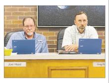 Jacksboro aldermen Joel Hood, left, and Greg Robinson listen to Ben Warnell’s complaint against the city and police department during the city council’s Monday, Oct. 23 meeting. The resident had a complaint about a neighbor’s business that he thought was not being resolved by the city and police department. Photo/Brian Smith