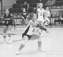 Jacksboro junior Lileigh Taylor goes in for the dig during the Tigerettes’ home opener Tuesday, Aug. 20 against Electra. The Purple overcame a slow start to win the match in four sets.