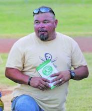 Kenny Salazar, seen here coaching baseball with the Perrin Youth Sports Association, will be remembered as a community and family man. Contributed photo
