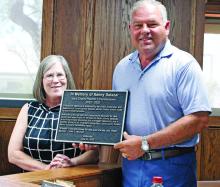 Jack County officials will dedicate the new Precinct 2 barn to late Commissioner Kenny Salazar at 10 a.m. Thursday, July 31. Pictured is Kenny’s wife and now Commissioner Amy Salazar and Jack County Judge Keith Umphress. Photo/Ashley Anderson
