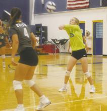 Bryson junior Braydee Thorne (5) returns a Munday serve during the Cowgirls’ match with the Mogulettes Aug. 15. The Cowgirls won the first two games but needed to pull out a tough game five to take the match win. Photo/Brian Smith