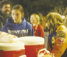 Bryson hosted its annual Christmas Tree Lighting, last Monday, Dec. 4. Here, FCCLA members Jaydah McComack and Raylynn Carnley supply the crowd with hot chocolate. Photo/Brian Smith
