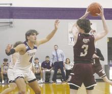 Cannon Valenzuela guards a Bowie player during their Tuesday, Jan. 2 loss to the Jackrabbits. Photo/Brian Smith