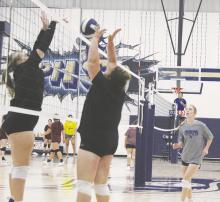 Bryson’s Brooke Bennett, right at net, does front-court battle with a Graford player during summer league action Monday, July 3 in Perrin. The Lady Rabbits defeated the Cowgirls. Both squads will begin regular season preparation Monday, July 31. Photo/Brian Smith
