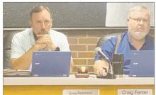 Jacksboro Place 3 Alderman Greg Robinson and Mayor Craig Fenter listen to a discussion on the city and Jacksboro ISD wishing to swap land during the Monday, June 26 city council meeting. Nothing was determined pending the JISD approving the swap. Photo/Brian Smith